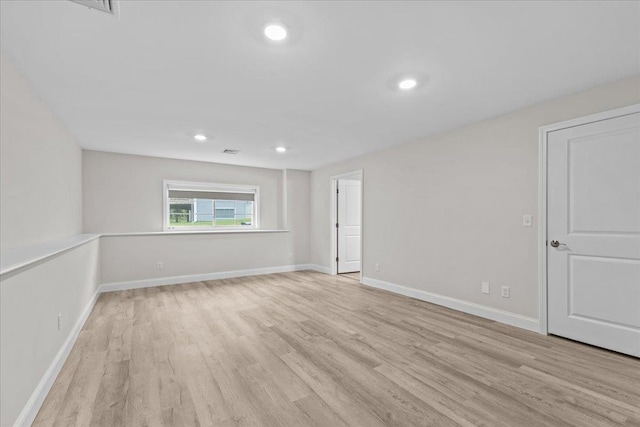 153 Ann Marie Ln, Colchester, VT 05446 - empty room with light wood-type flooring, recessed lighting, and baseboards