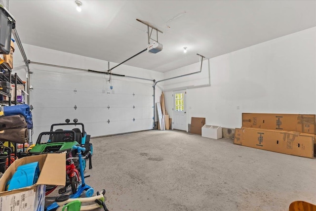 153 Ann Marie Ln, Colchester, VT 05446 - garage featuring a garage door opener