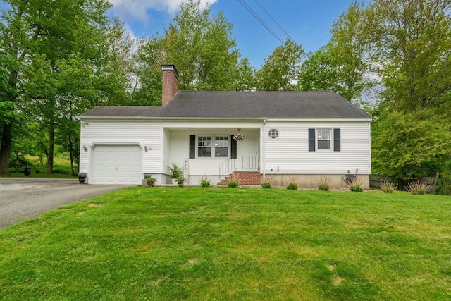 11 Beauchesne Dr, Hooksett, NH 03106 - single story home with a garage, a chimney, and asphalt driveway