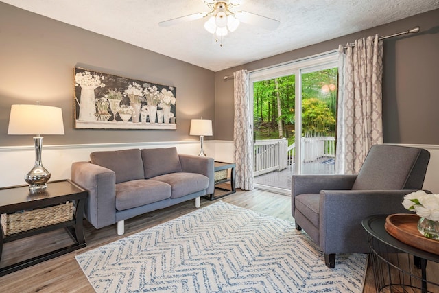 11 Beauchesne Dr, Hooksett, NH 03106 - living area with ceiling fan, wood finished floors, and a textured ceiling