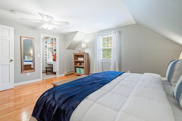 11 Beauchesne Dr, Hooksett, NH 03106 - bedroom with baseboard heating, wood finished floors, lofted ceiling, a ceiling fan, and baseboards