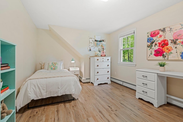 11 Beauchesne Dr, Hooksett, NH 03106 - bedroom with light wood-type flooring and a baseboard heating unit