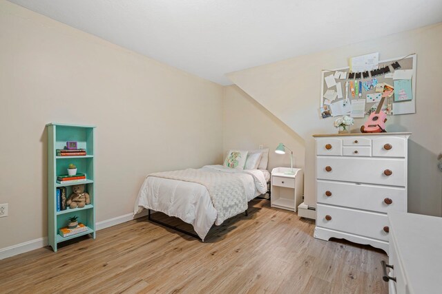 11 Beauchesne Dr, Hooksett, NH 03106 - bedroom featuring light wood finished floors, a baseboard radiator, and baseboards
