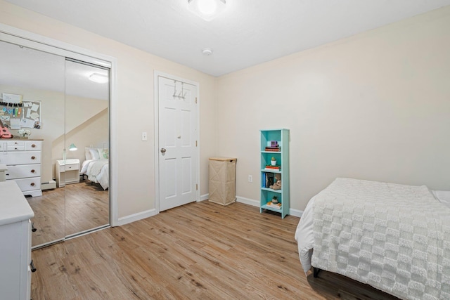 11 Beauchesne Dr, Hooksett, NH 03106 - bedroom featuring light wood finished floors, baseboards, and a closet