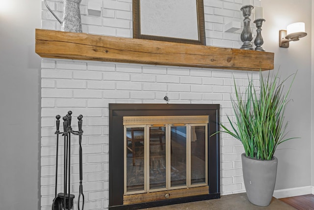 11 Beauchesne Dr, Hooksett, NH 03106 - detailed view of baseboards and a fireplace