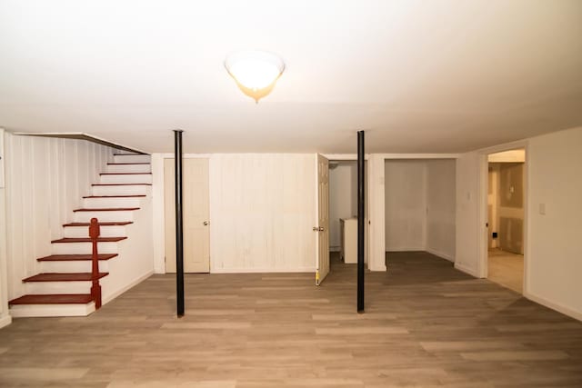 82 S Jewett St, Manchester, NH 03103 - finished basement featuring light wood finished floors, stairs, and baseboards