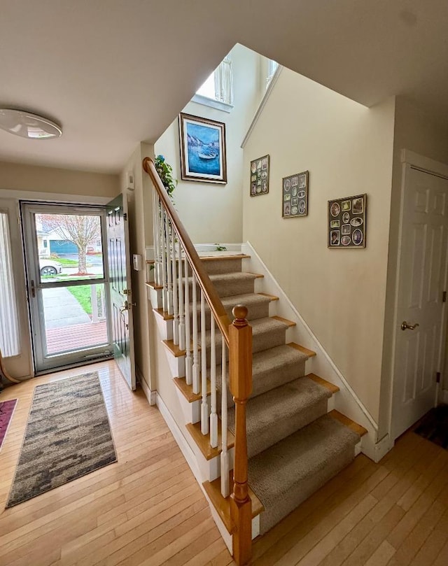 1 Stannard Dr, Essex, VT 05452 - stairs featuring hardwood / wood-style flooring and baseboards