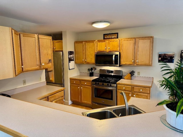 1 Stannard Dr, Essex, VT 05452 - kitchen with appliances with stainless steel finishes, a sink, and light countertops
