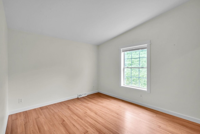 2547 River Rd, Moretown, VT 05602 - spare room with lofted ceiling, wood finished floors, and baseboards