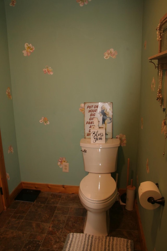 2884 Tampico Rd, Danville, VT 05828 - bathroom with baseboards, toilet, and stone finish flooring