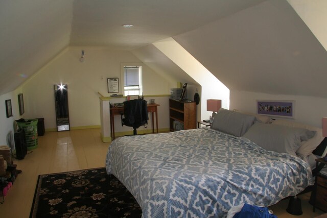 2884 Tampico Rd, Danville, VT 05828 - bedroom with lofted ceiling and wood finished floors