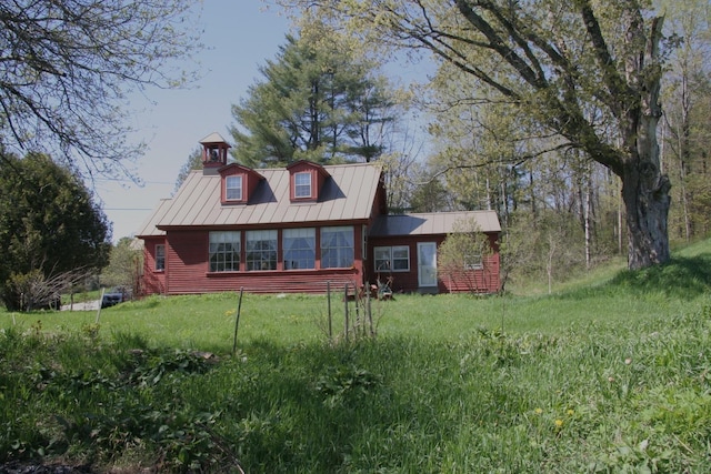 2884 Tampico Rd, Danville, VT 05828 - view of front facade with metal roof and a standing seam roof