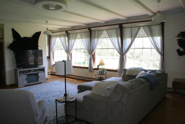 2884 Tampico Rd, Danville, VT 05828 - living area with beamed ceiling, wood finished floors, and wainscoting