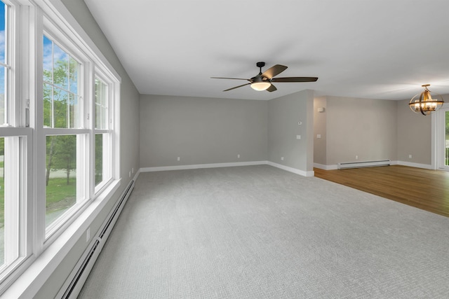 10 Call Rd, Webster, NH 03303 - unfurnished room with baseboard heating, a chandelier, baseboards, and a ceiling fan