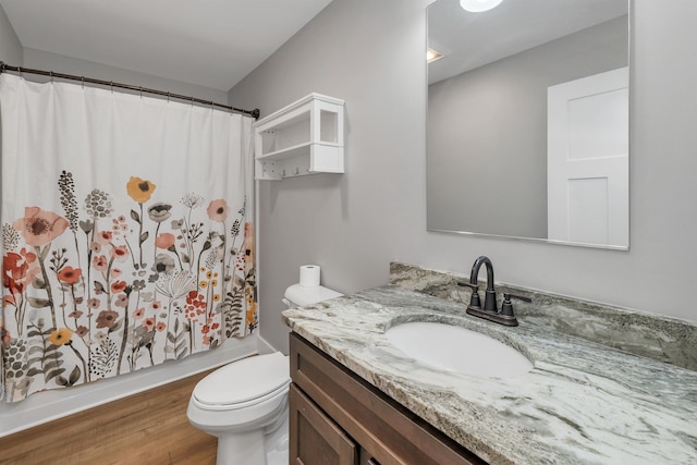 10 Call Rd, Webster, NH 03303 - bathroom featuring vanity, toilet, wood finished floors, and shower / bath combination with curtain