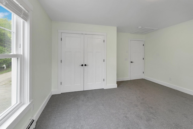 10 Call Rd, Webster, NH 03303 - unfurnished bedroom featuring carpet, baseboard heating, baseboards, and a closet