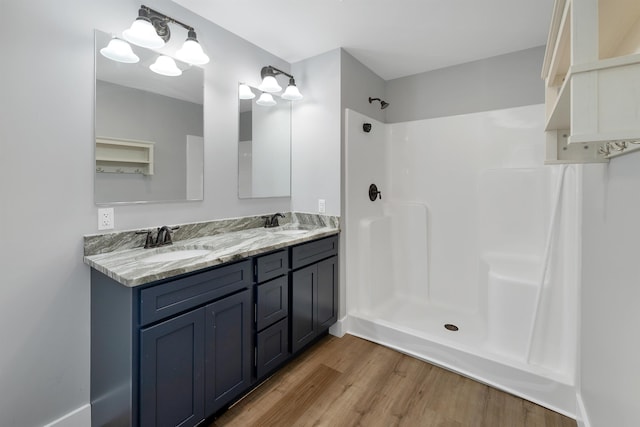 10 Call Rd, Webster, NH 03303 - full bath with wood finished floors, double vanity, and a shower