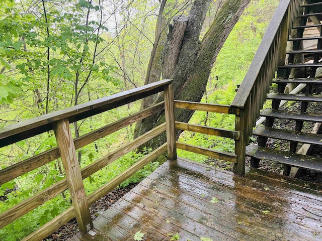 1334 Back Center Rd, Lyndon, VT 05851 - wooden terrace with stairs and a wooded view