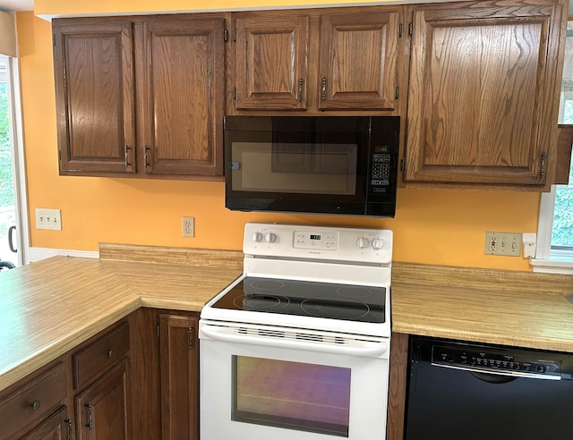 34 Hampshire Cir, Brattleboro, VT 05301 - kitchen featuring black appliances and light countertops