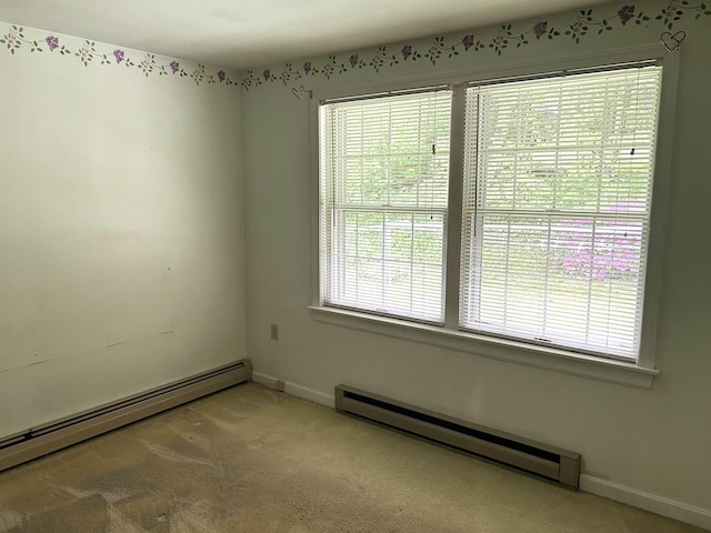 34 Hampshire Cir, Brattleboro, VT 05301 - spare room with a baseboard radiator, healthy amount of natural light, and baseboards