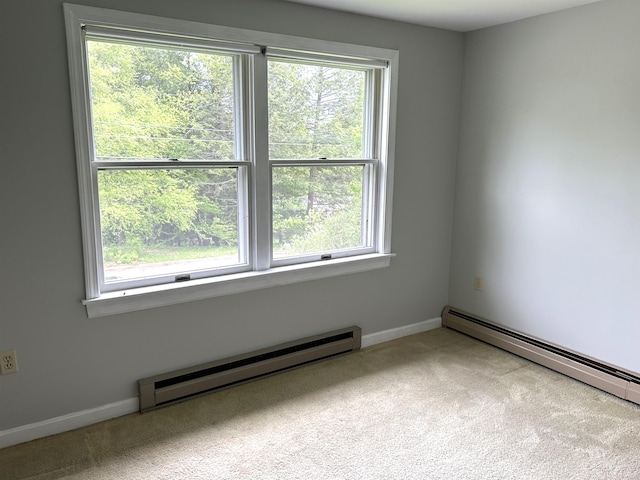 34 Hampshire Cir, Brattleboro, VT 05301 - carpeted spare room with a baseboard heating unit and baseboards