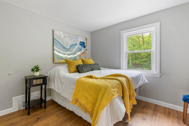 65 Sanborn St, Laconia, NH 03246 - bedroom featuring baseboards and wood finished floors