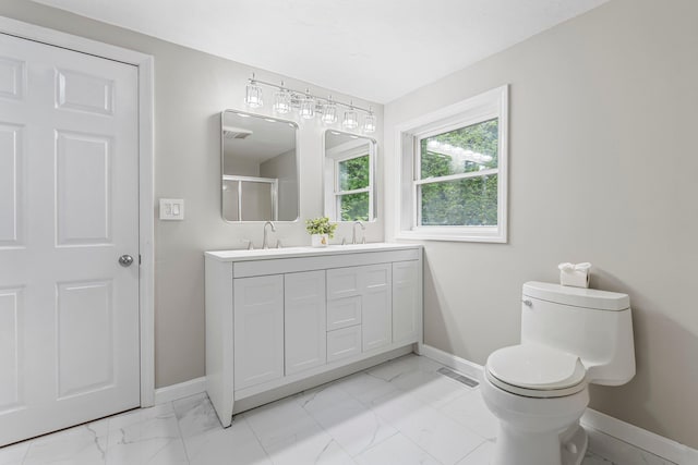 65 Sanborn St, Laconia, NH 03246 - bathroom featuring marble look tile flooring and baseboards