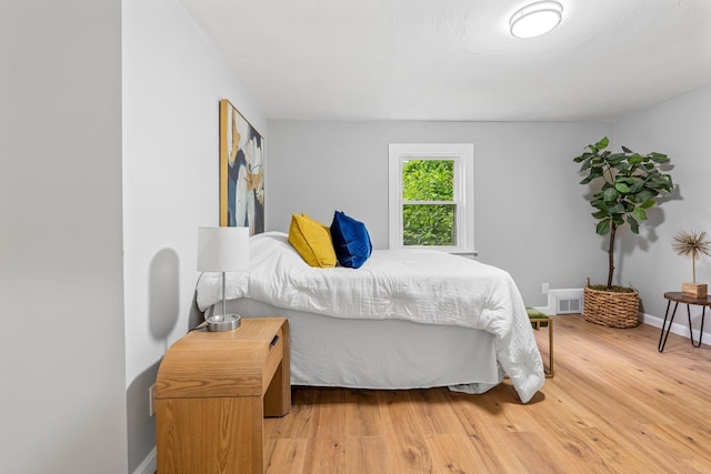 65 Sanborn St, Laconia, NH 03246 - bedroom featuring wood finished floors and baseboards