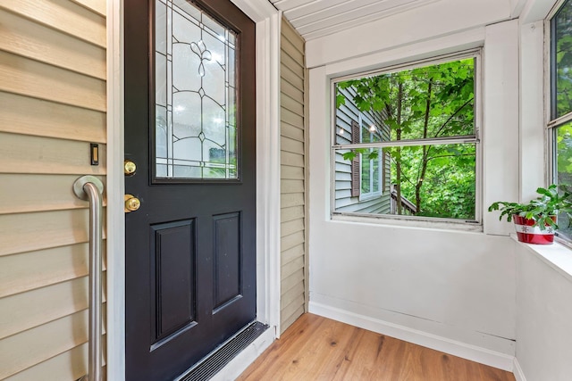 65 Sanborn St, Laconia, NH 03246 - doorway to property with covered porch