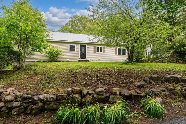 65 Sanborn St, Laconia, NH 03246 - view of front of house featuring metal roof