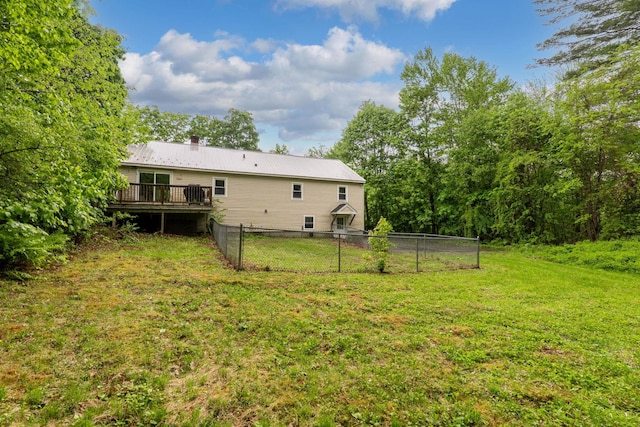 65 Sanborn St, Laconia, NH 03246 - rear view of house featuring a deck and metal roof