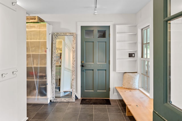 2192 Jack Hill Rd, Calais, VT 05650 - mudroom with track lighting, dark tile patterned floors, and built in features