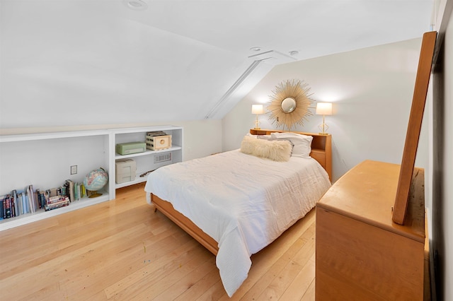 2192 Jack Hill Rd, Calais, VT 05650 - bedroom featuring light wood-type flooring and vaulted ceiling