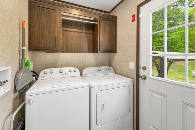 29 Stoneham Rd Unit 4, Wakefield, NH 03872 - laundry area with cabinet space, washing machine and clothes dryer, healthy amount of natural light, and wallpapered walls