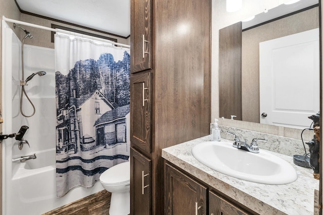 29 Stoneham Rd Unit 4, Wakefield, NH 03872 - bathroom with vanity, toilet, shower / bath combo with shower curtain, and wood finished floors