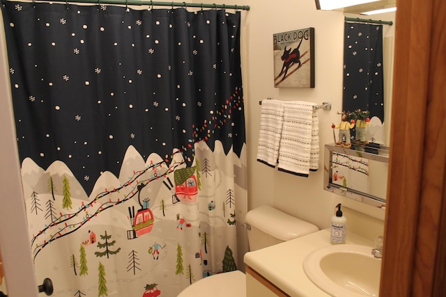 16 Penstock Rd Unit 4, Lincoln, NH 03251 - full bathroom with vanity, toilet, and a shower with curtain