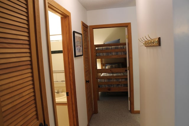 16 Penstock Rd Unit 4, Lincoln, NH 03251 - corridor featuring carpet floors