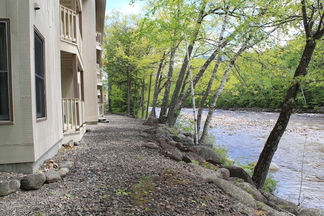 16 Penstock Rd Unit 4, Lincoln, NH 03251 - view of yard featuring a water view