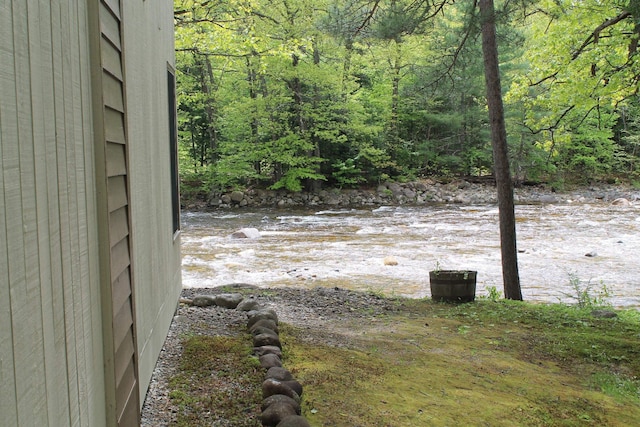 16 Penstock Rd Unit 4, Lincoln, NH 03251 - view of yard featuring a forest view