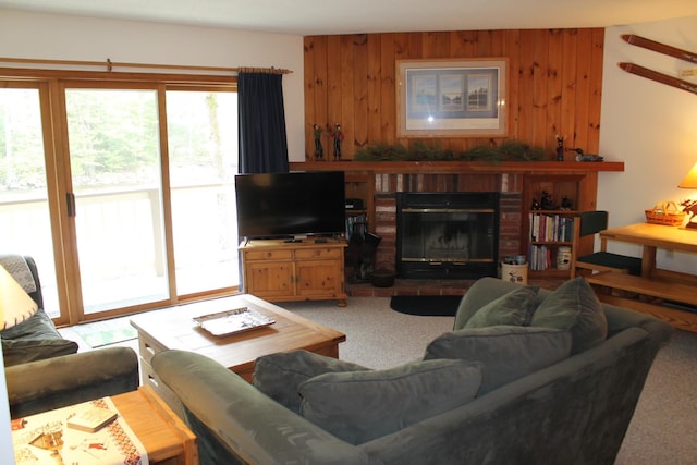 16 Penstock Rd Unit 4, Lincoln, NH 03251 - living area featuring a brick fireplace, light colored carpet, and wooden walls