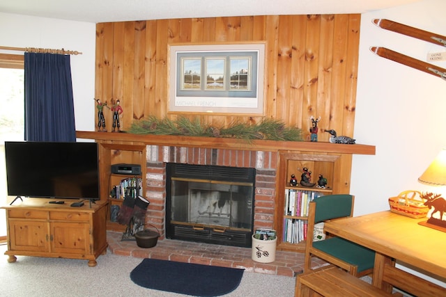 16 Penstock Rd Unit 4, Lincoln, NH 03251 - living area with a fireplace, carpet flooring, and wooden walls