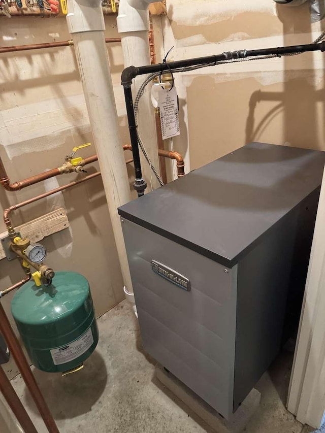 87 Juniper Dr, South Burlington, VT 05403 - utility room featuring a heating unit