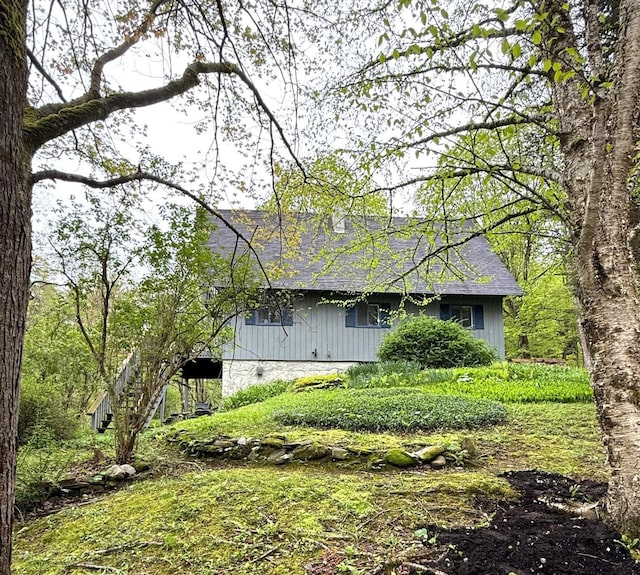 191 Highland Rd, Wallingford, VT 05773 - view of side of home with roof with shingles