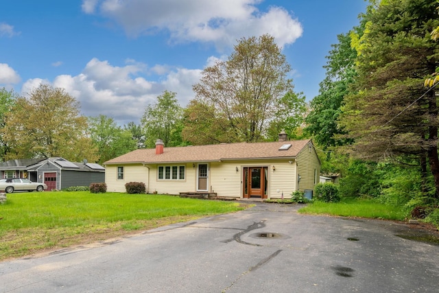 28 Joslin Rd, Swanzey, NH 03431 - ranch-style house with a chimney, a front lawn, and driveway