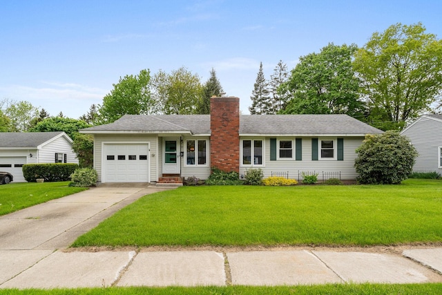 33 Wildwood Dr, Burlington, VT 05408 - ranch-style home featuring an attached garage, a chimney, driveway, and a front yard