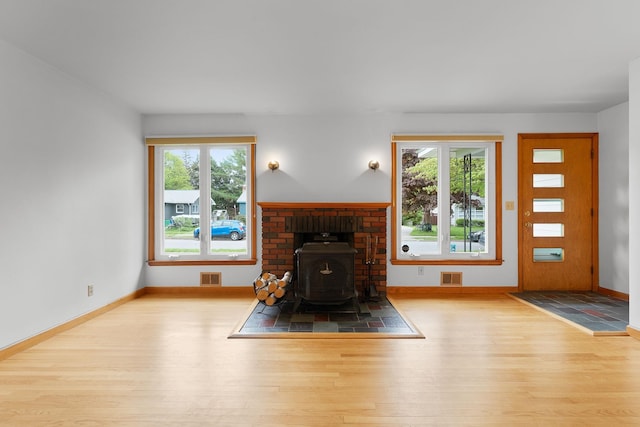 33 Wildwood Dr, Burlington, VT 05408 - living room with wood finished floors, healthy amount of natural light, and baseboards