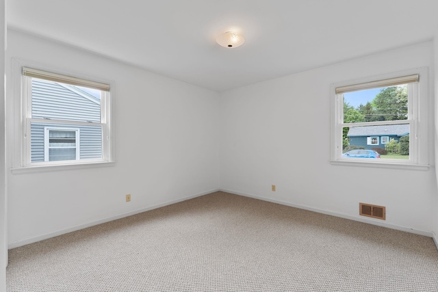 33 Wildwood Dr, Burlington, VT 05408 - unfurnished room with carpet flooring, healthy amount of natural light, and baseboards
