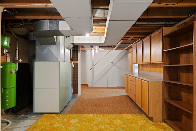 33 Wildwood Dr, Burlington, VT 05408 - unfinished basement featuring heating unit and stairs