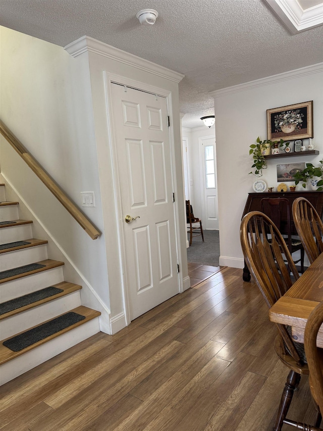 11 Modena Dr Unit 11, Concord, NH 03303 - stairway with a textured ceiling, ornamental molding, wood finished floors, and baseboards