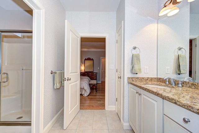 17 Misty Meadow Rd Unit 17, Windham, NH 03087 - full bathroom with baseboards, wallpapered walls, a stall shower, vanity, and tile patterned floors